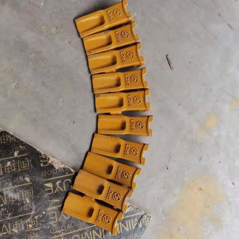 Adaptateur de dent de seau pour excavateur et plaque de lame meilleur prix et dent de seau dure