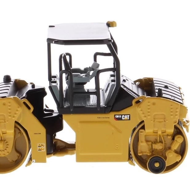 1:64 DM CB-13 Modèle de rouleau vibrant Caterpillar Véhicule d'ingénierie de construction 85630